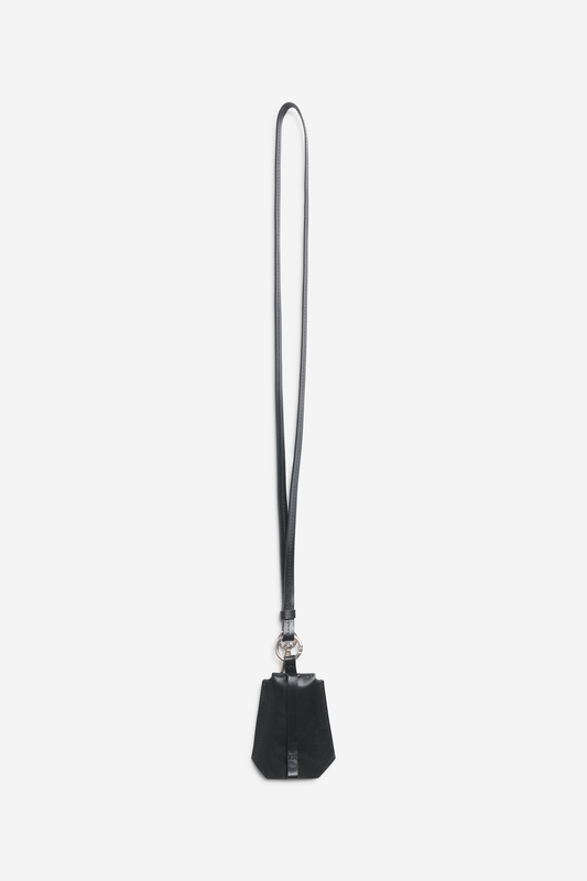 Unisex accessories key chain, vegetable-tanned leather, black, with long strap and Bluetooth tracker compartment.