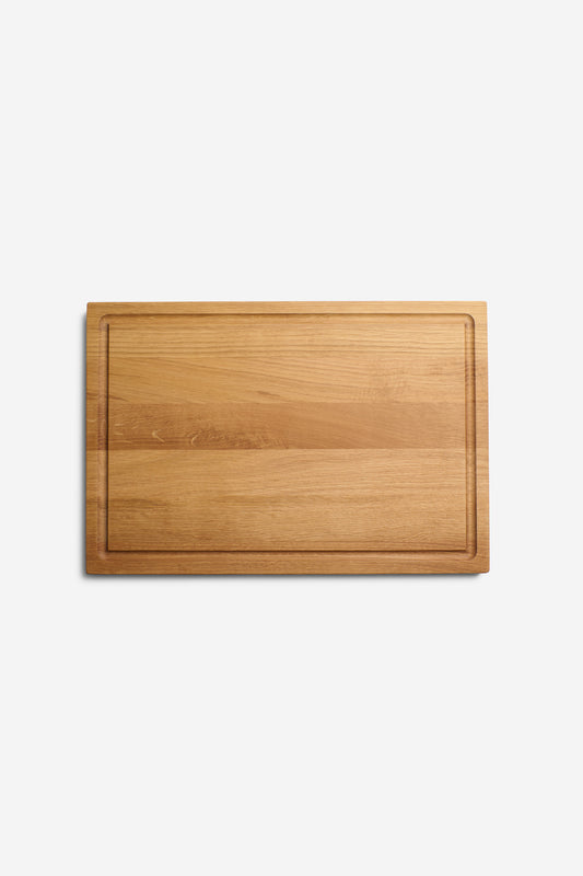 Rectangular oak chopping board with juice groove, handcrafted in Germany.