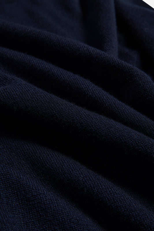 Unisex knit crewneck, navy mulesing-free merino wool with rib-knit details.
