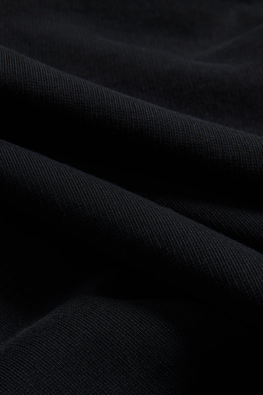 Men's/Women's jersey hoodie, 100% organic cotton, pre-washed black heavy jersey fabric with subtle texture.