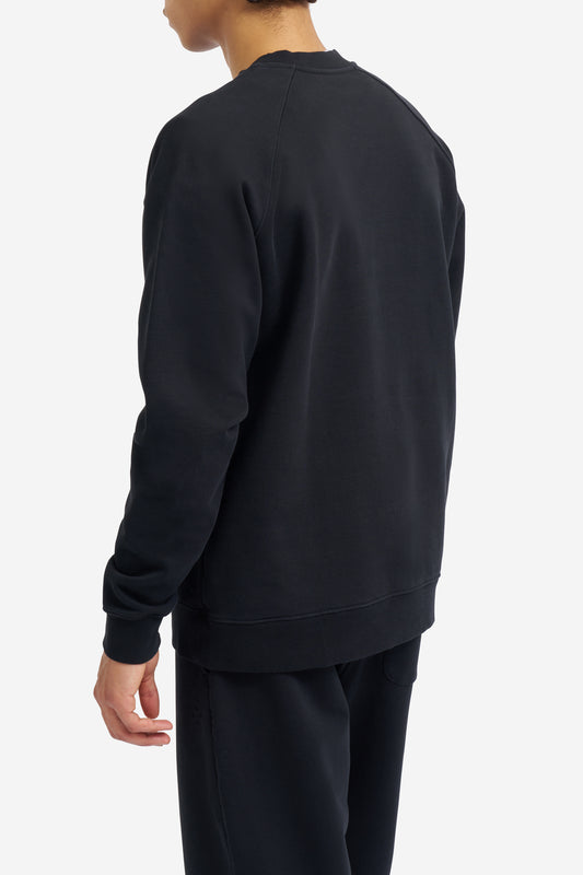 Men's jersey sweater, organic cotton, pre-washed, black, with raglan sleeves.
