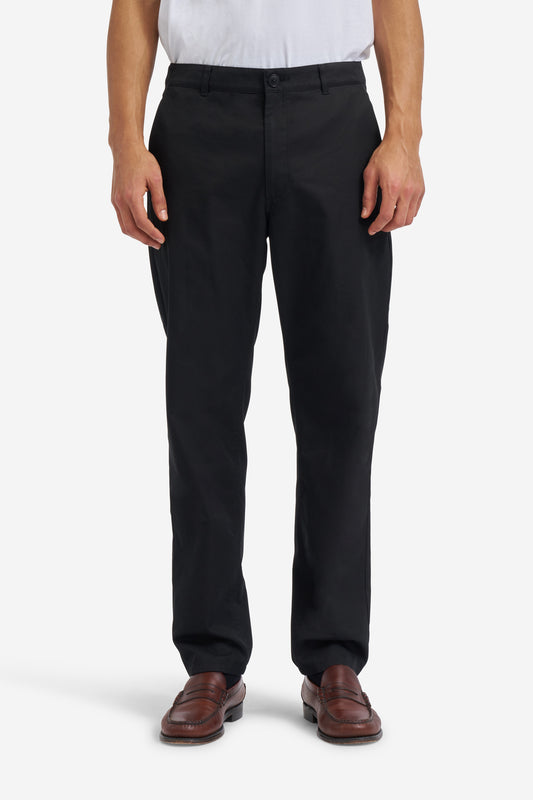 Men's long-pants, organic cotton twill, washed black, flat front, side pockets, button-up box back pockets.