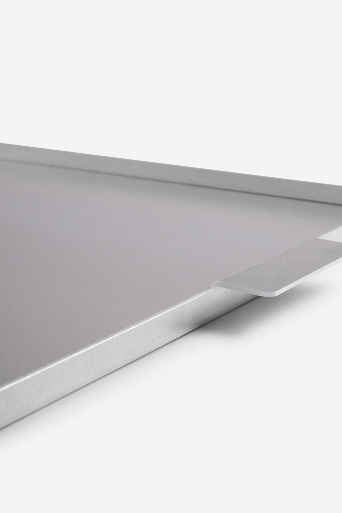 Accessories tray, large, uncoated aluminium, 53x34cm, with subtle handle detail.