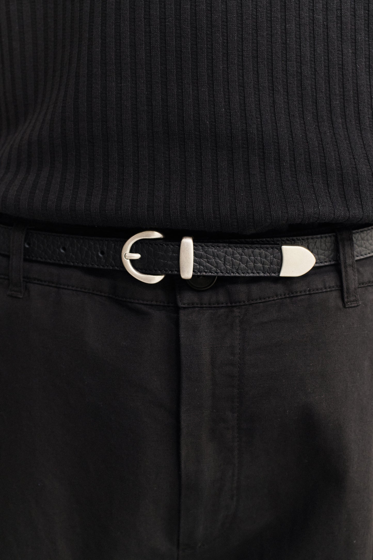 Men's accessories belt, black grainy calf leather with a silver buckle.