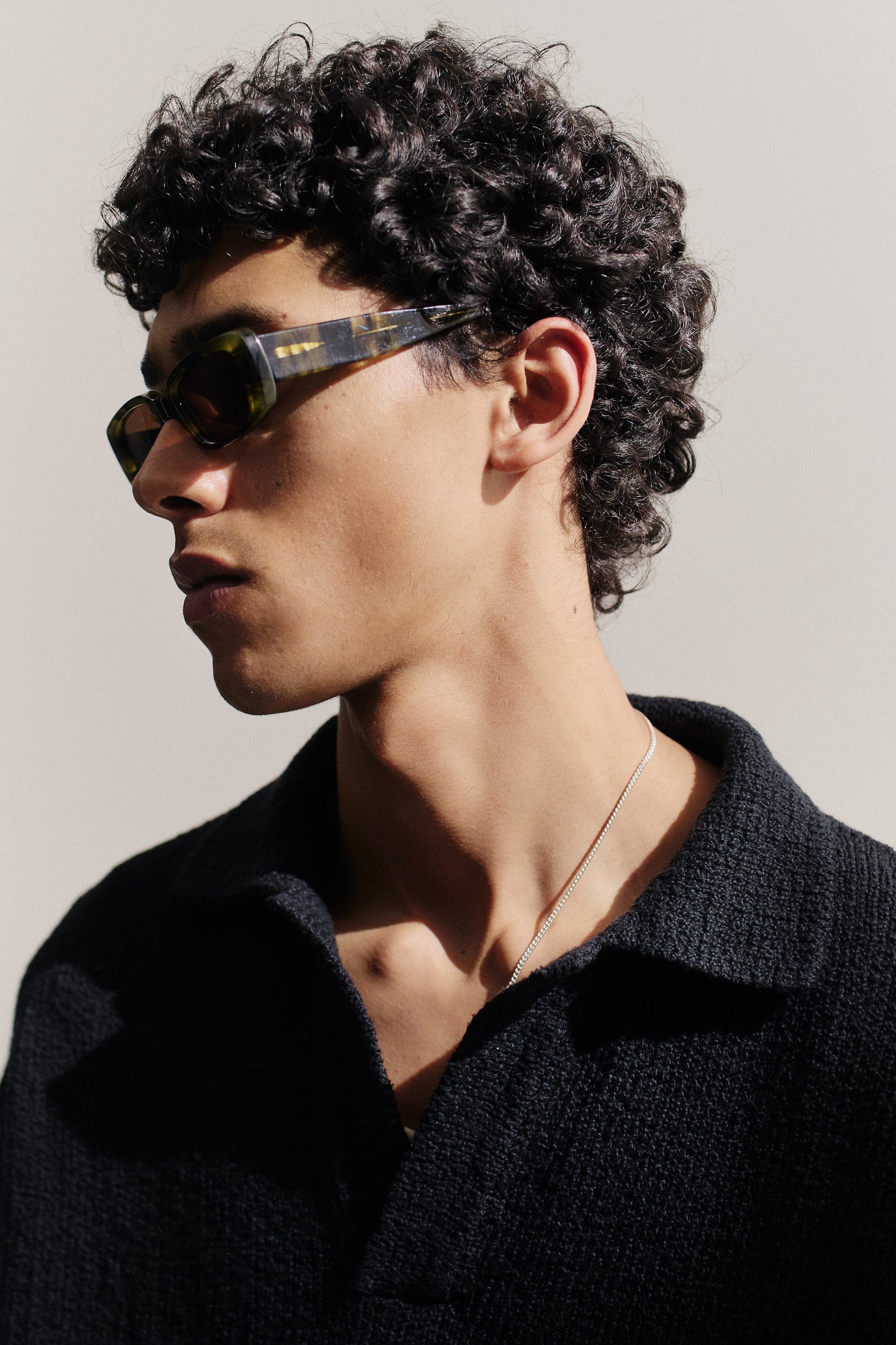 Men's accessories sunglasses, ODESSA acetate, tortoise shell frame with dark lenses.