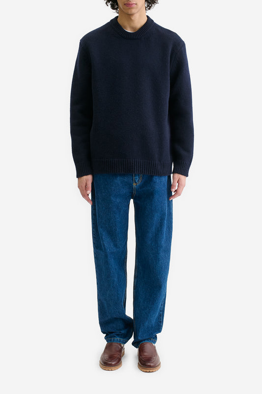 Men's knit pullover, wool-cashmere blend, navy, relaxed fit, rib-knit neck, cuffs, and hem.