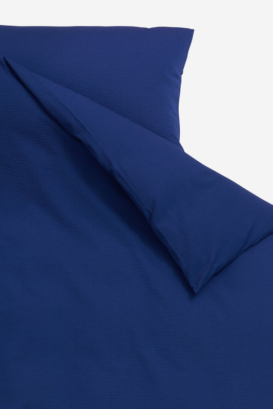 Accessories pillowcase, 100% organic cotton, textured blue hour, 80x80cm, with zipper closure.