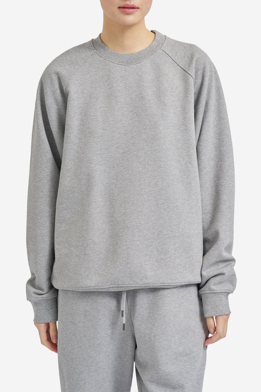 Unisex knit jersey, grey melange organic cotton raglan sleeve sweater, pre-washed.