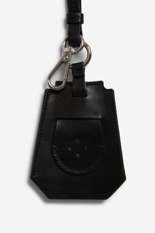 Unisex accessories key chain, black vegetable-tanned leather with silver hardware and tracker compartment.
