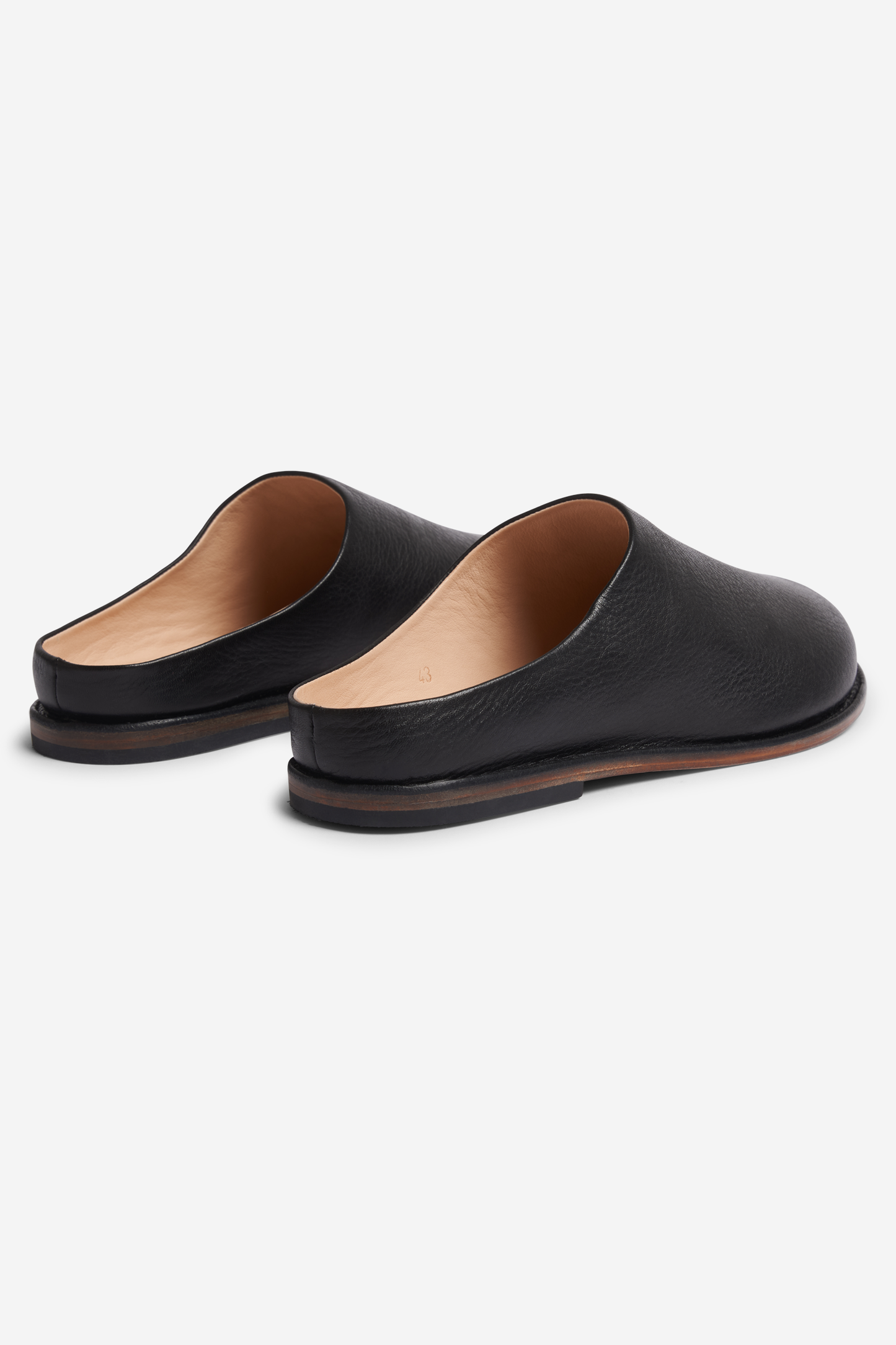 Unisex accessories slippers, black chrome-free cow leather, handmade, with natural leather lining and dark sole.