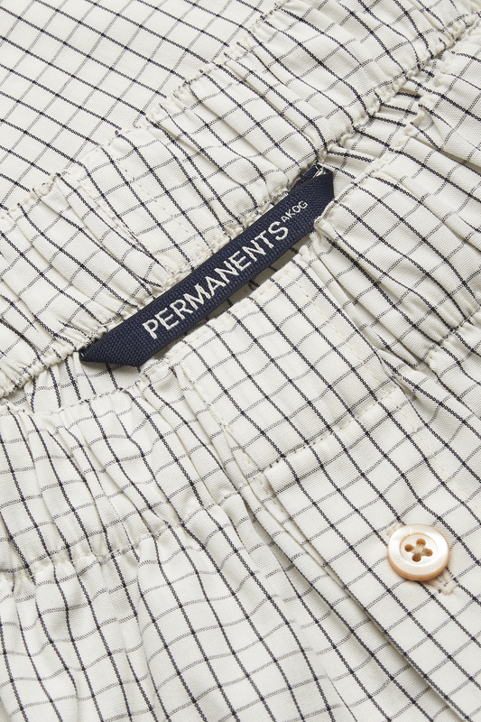 Men's jersey boxershorts, organic cotton, white with black grid pattern, elastic waistband, button closure.