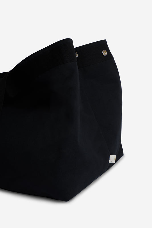 Unisex accessories carryall bag, recycled Ventile cotton, black, with two handle lengths and interior pocket.