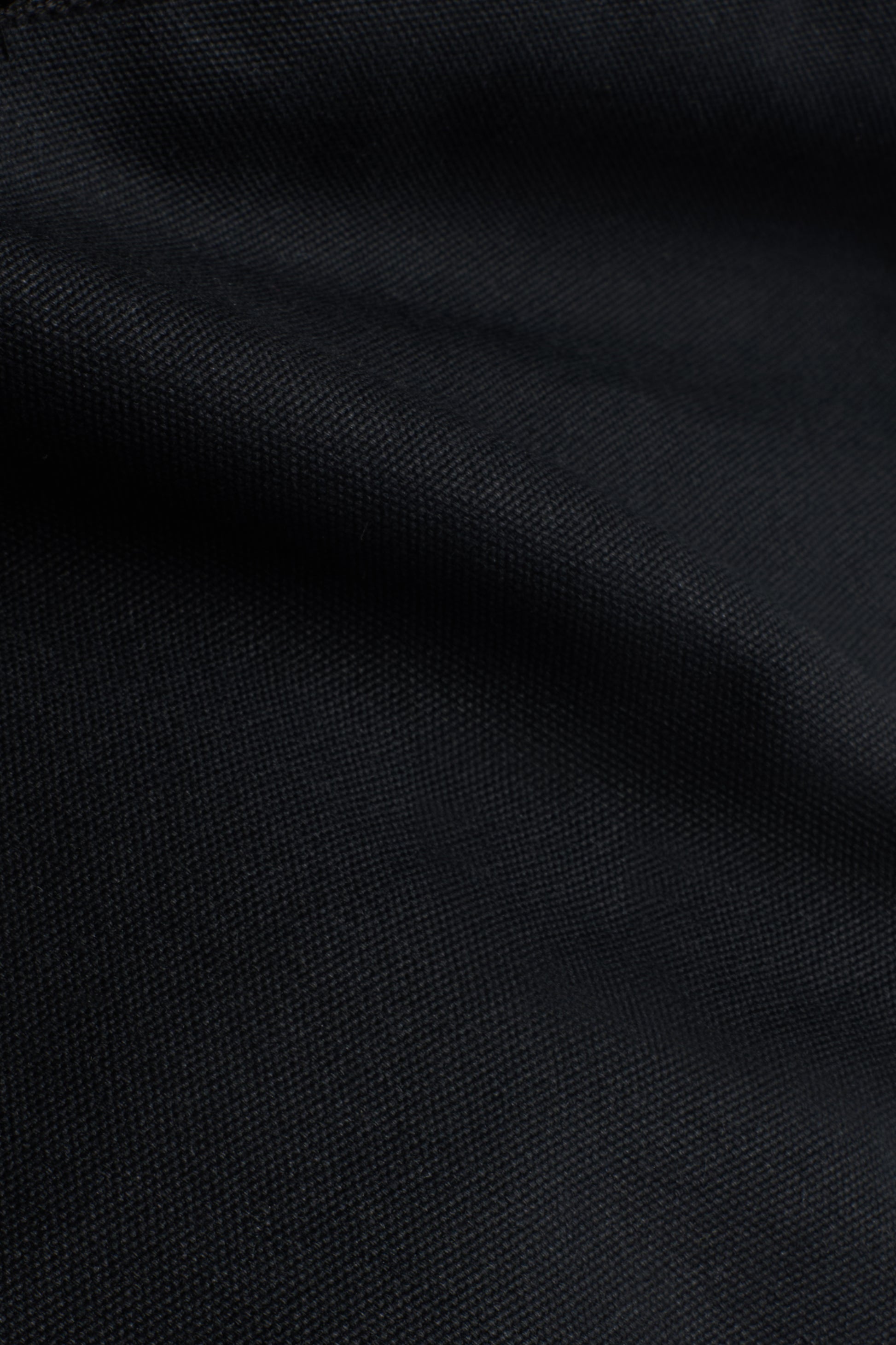 Unisex accessories carryall bag, recycled Ventile cotton, black, with subtle fabric texture.