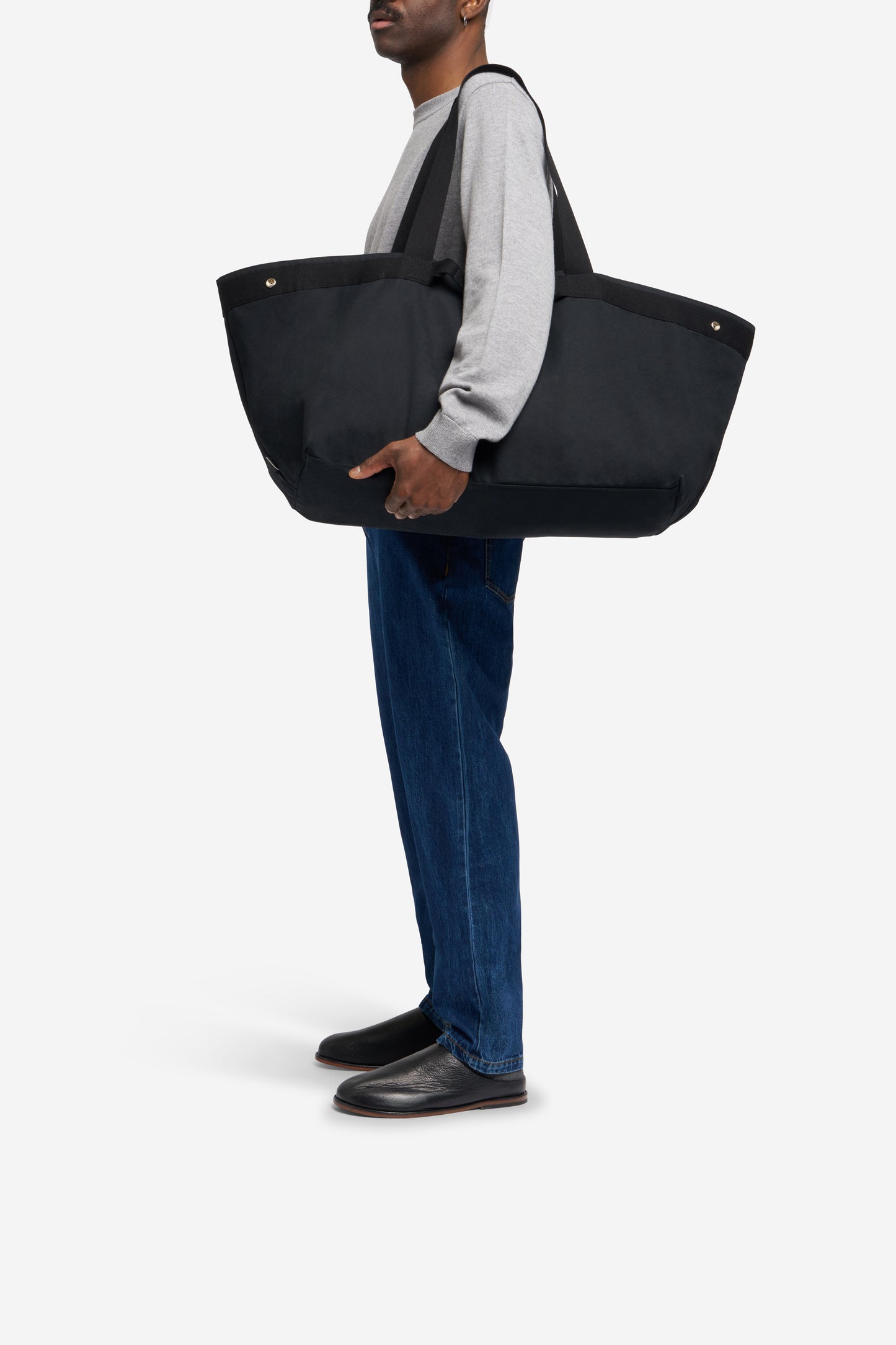 Men's accessories carryall bag, recycled Ventile cotton, black, with two handle lengths.