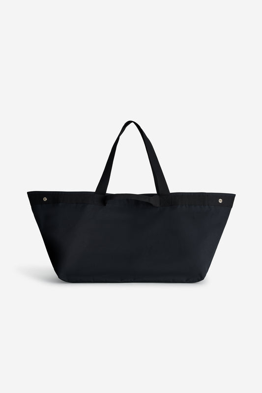 Unisex accessories carryall bag, recycled Ventile cotton, black, with two handle lengths and snap closures.