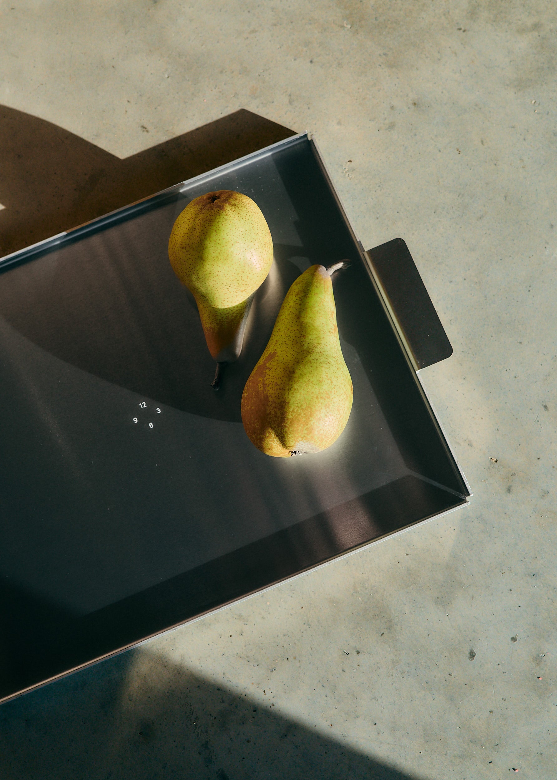 Accessories tray, small, uncoated aluminium, with two pears.