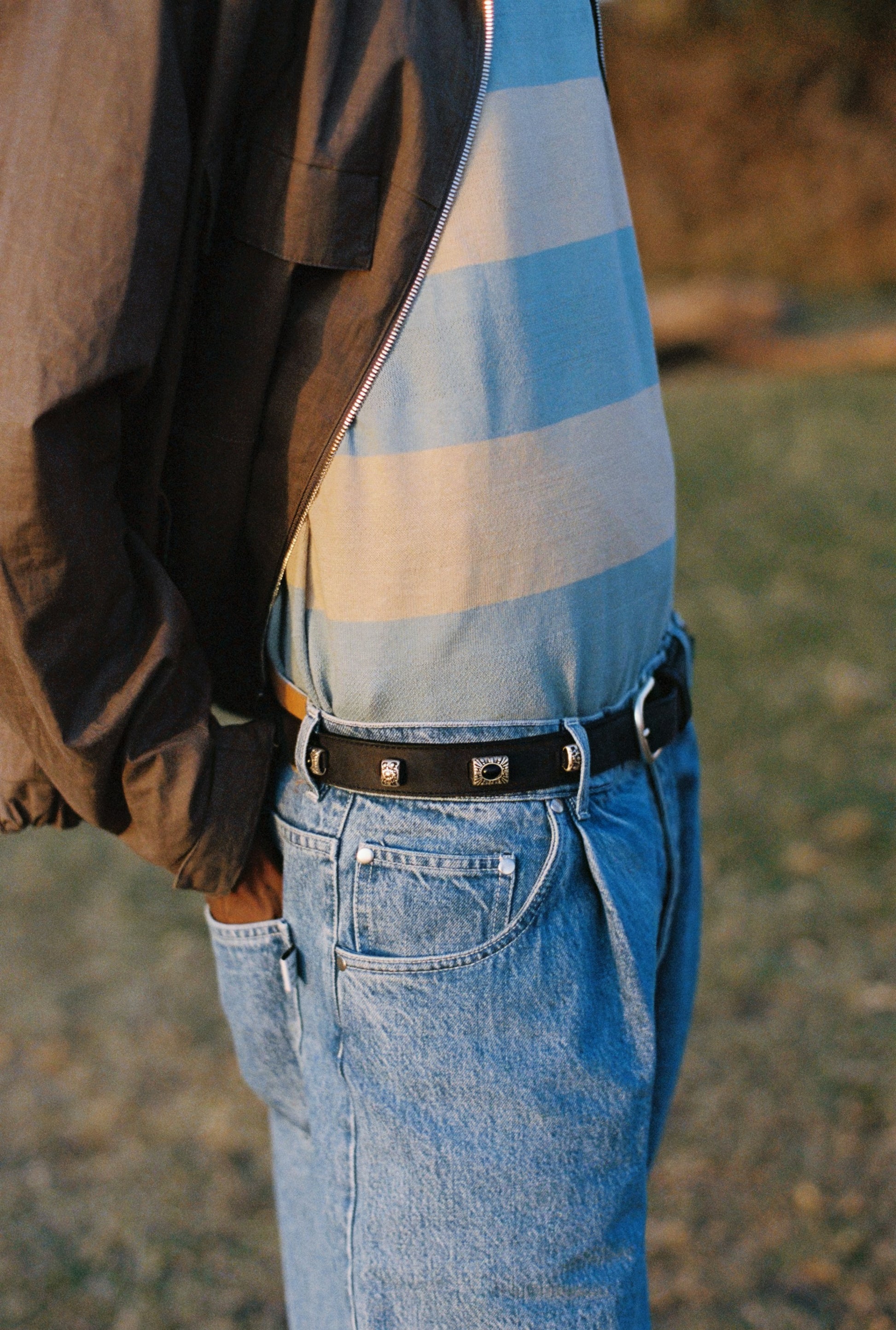 Men's accessories belt, black calf leather with vintage finish, silver-tone studs and buckle.