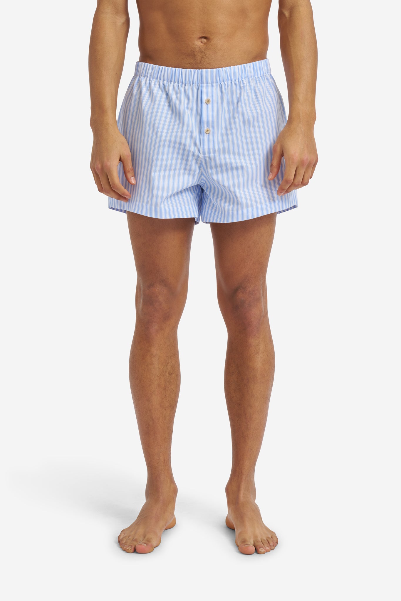 Men's jersey boxershorts, 100% organic cotton, light blue and white striped, with button fly.