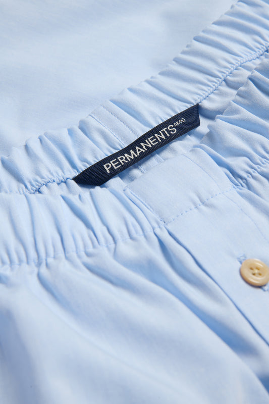 Men's jersey boxershorts, 100% organic cotton, light blue, with elastic waistband and brand tag.