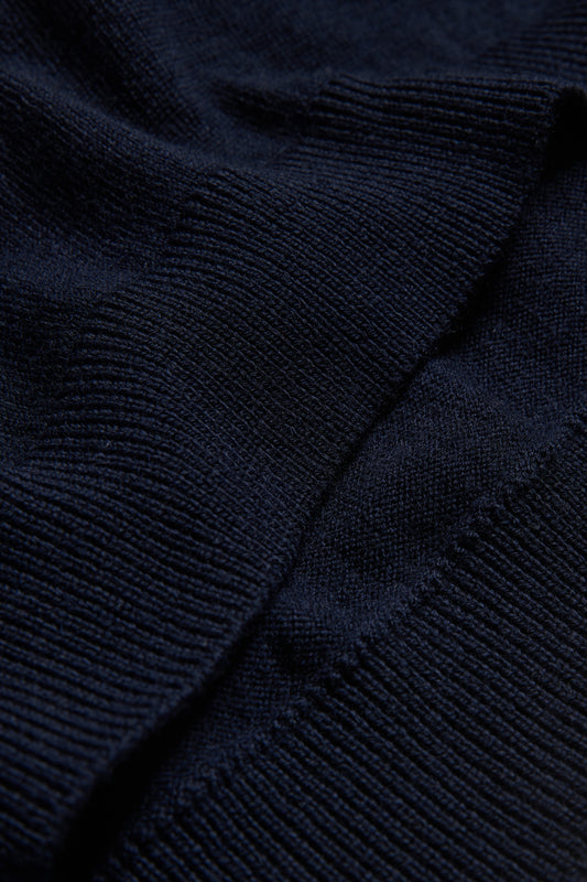 Unisex knit crewneck, finely knitted navy mulesing-free merino wool with rib-knit details.