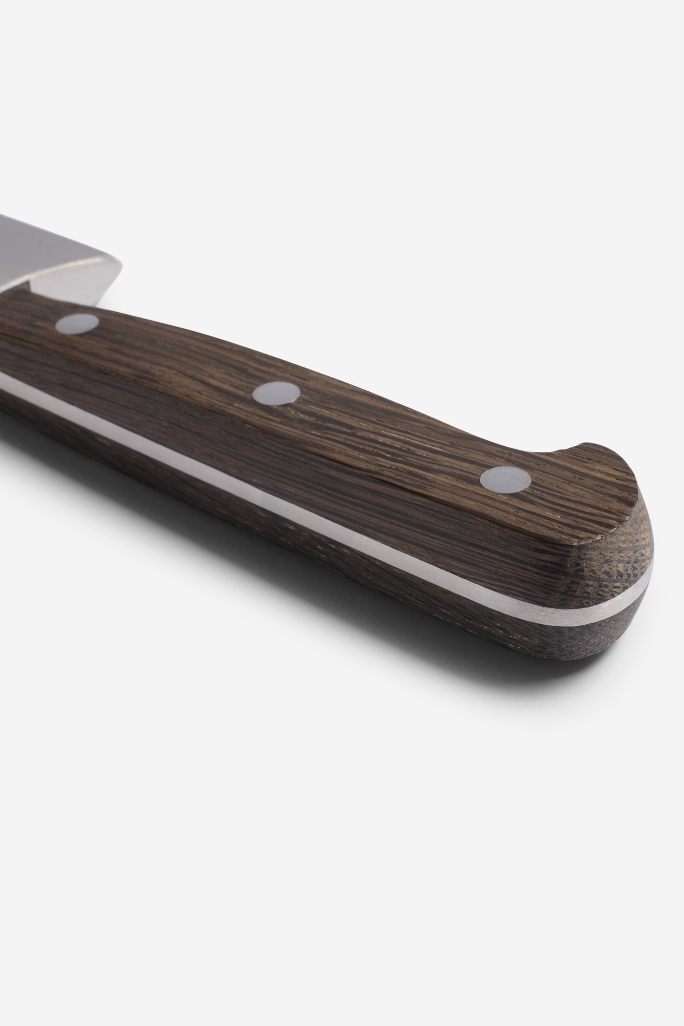 Chef's knife with dark brown bog oak handle, silver rivets, and a light accent line.