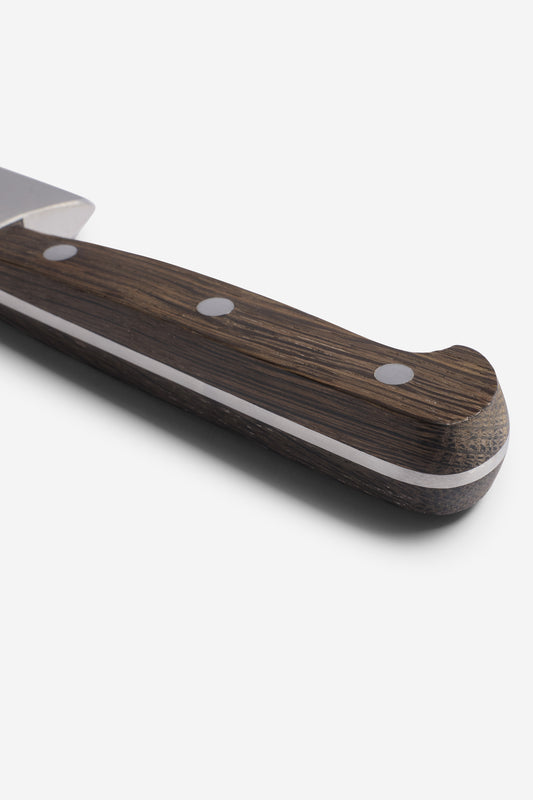 Chef's knife with dark brown bog oak handle, silver rivets, and a light accent line.
