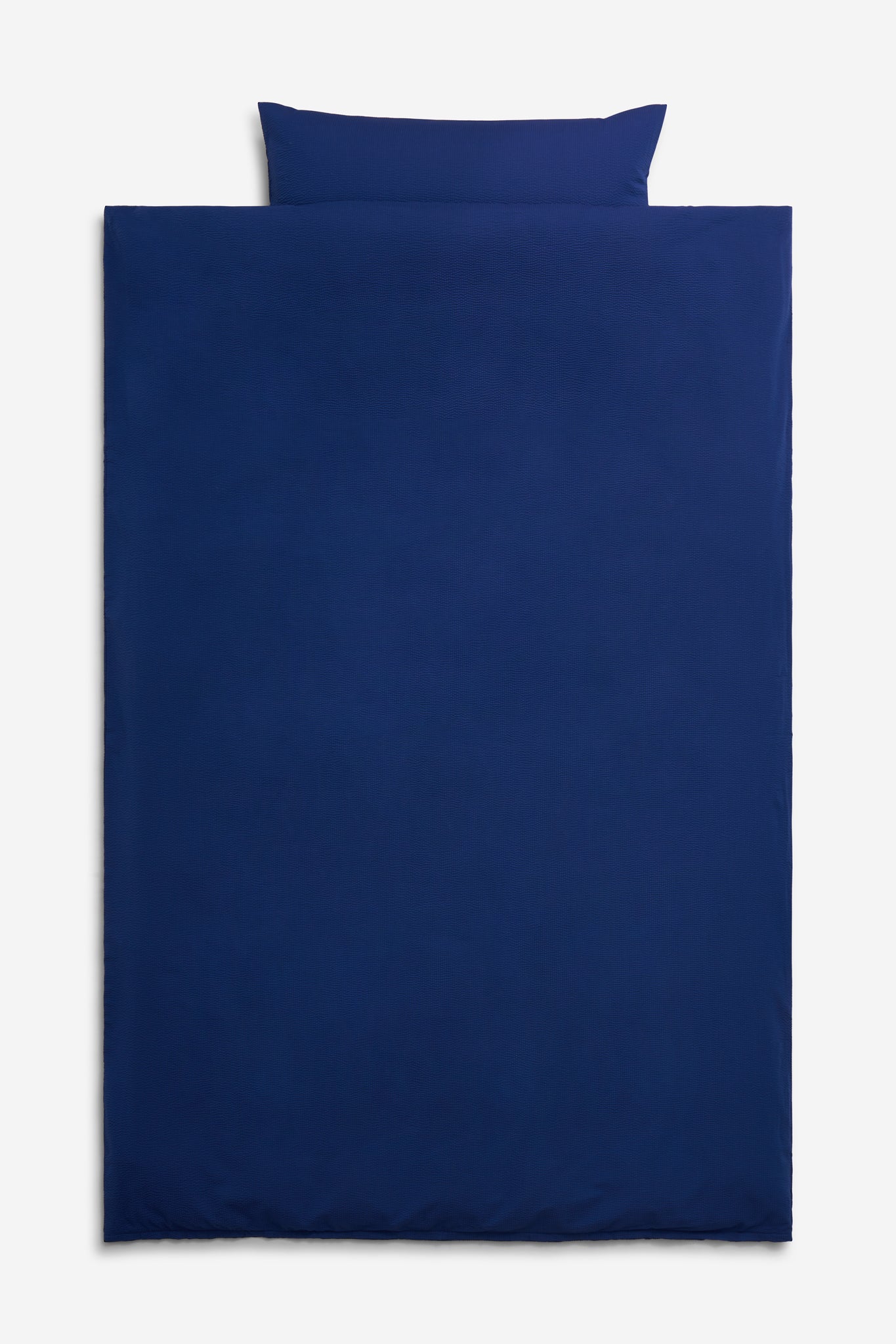 Duvet cover and pillowcase set, 100% organic cotton seersucker, "blue hour" navy, 140x200cm.