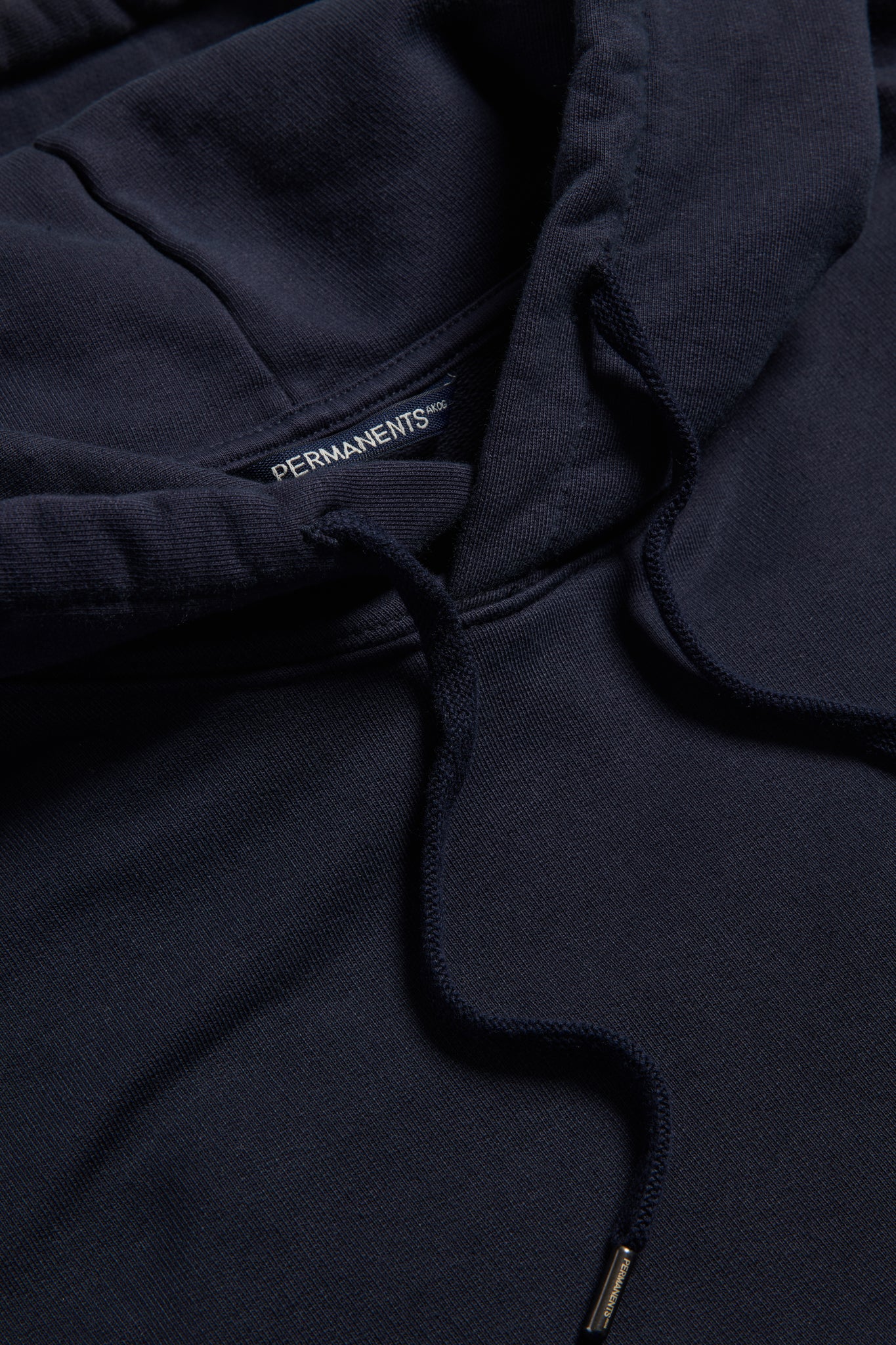 Men's/Women's jersey hoodie, 100% organic cotton, pre-washed, navy, with adjustable hood and embroidered logo.