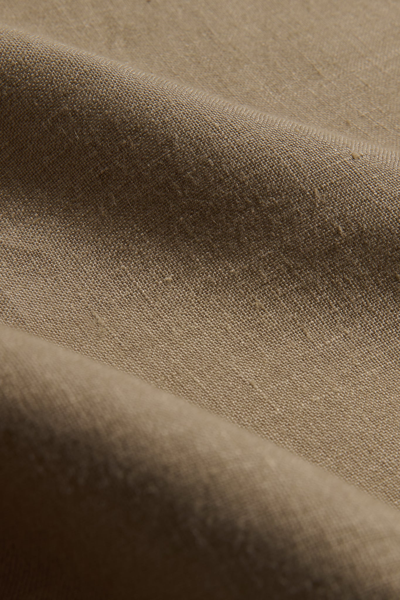 Accessories pillowcase, 100% Belgian linen, clay color, 80x80cm, with subtle texture and soft folds.