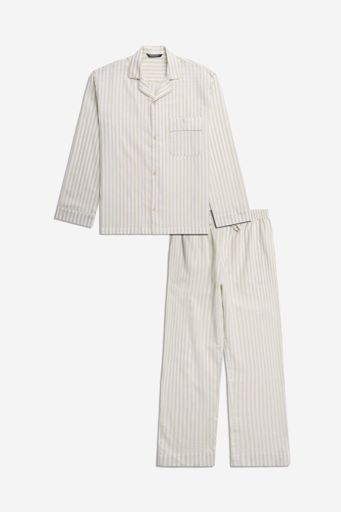 Unisex long-sleeved shirt and long-pants pyjama set in sage stripe organic cotton seersucker with piped trim.
