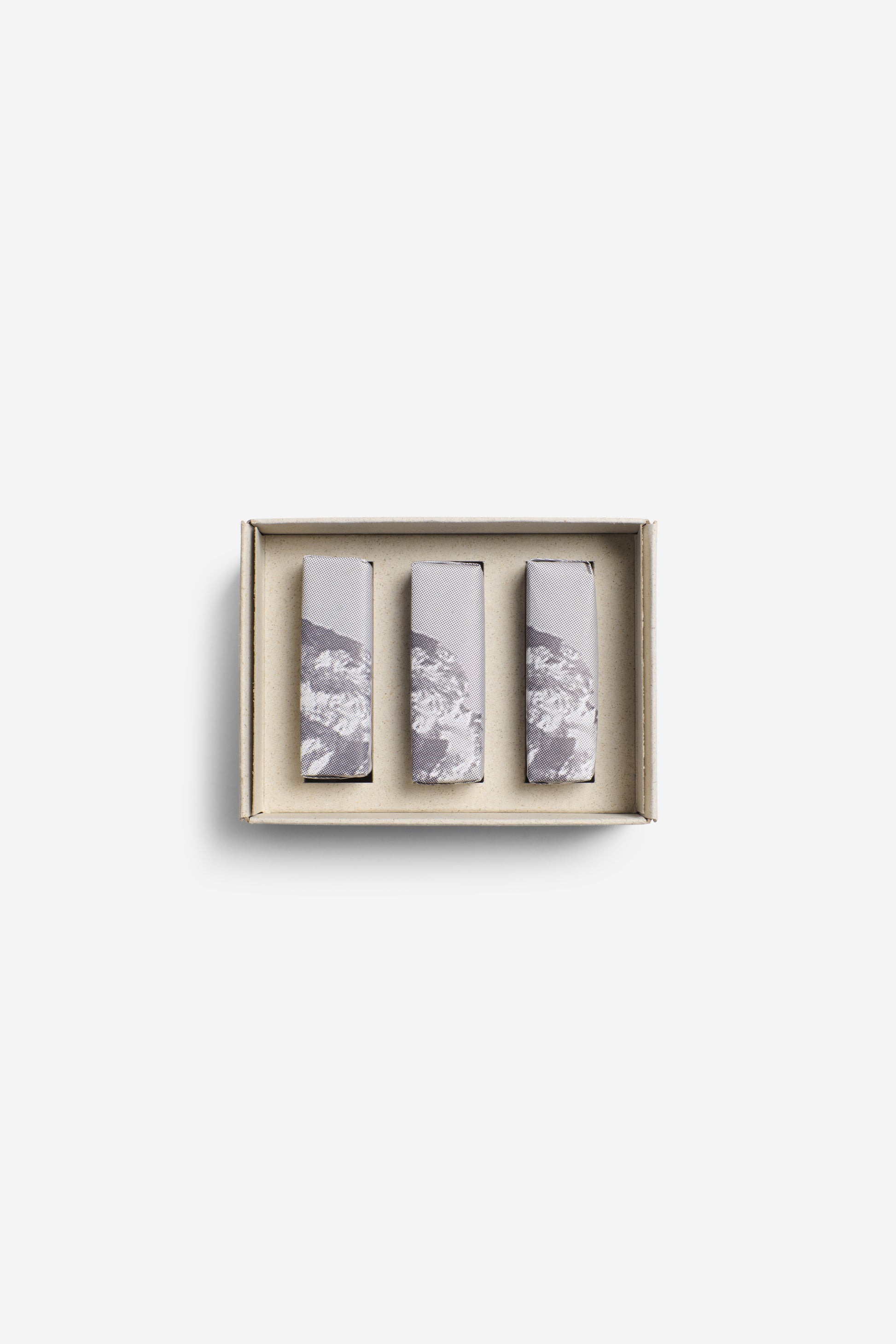 Women's accessories, set of 3 organic soap bars in a natural cardboard box, white with grey mountain design.