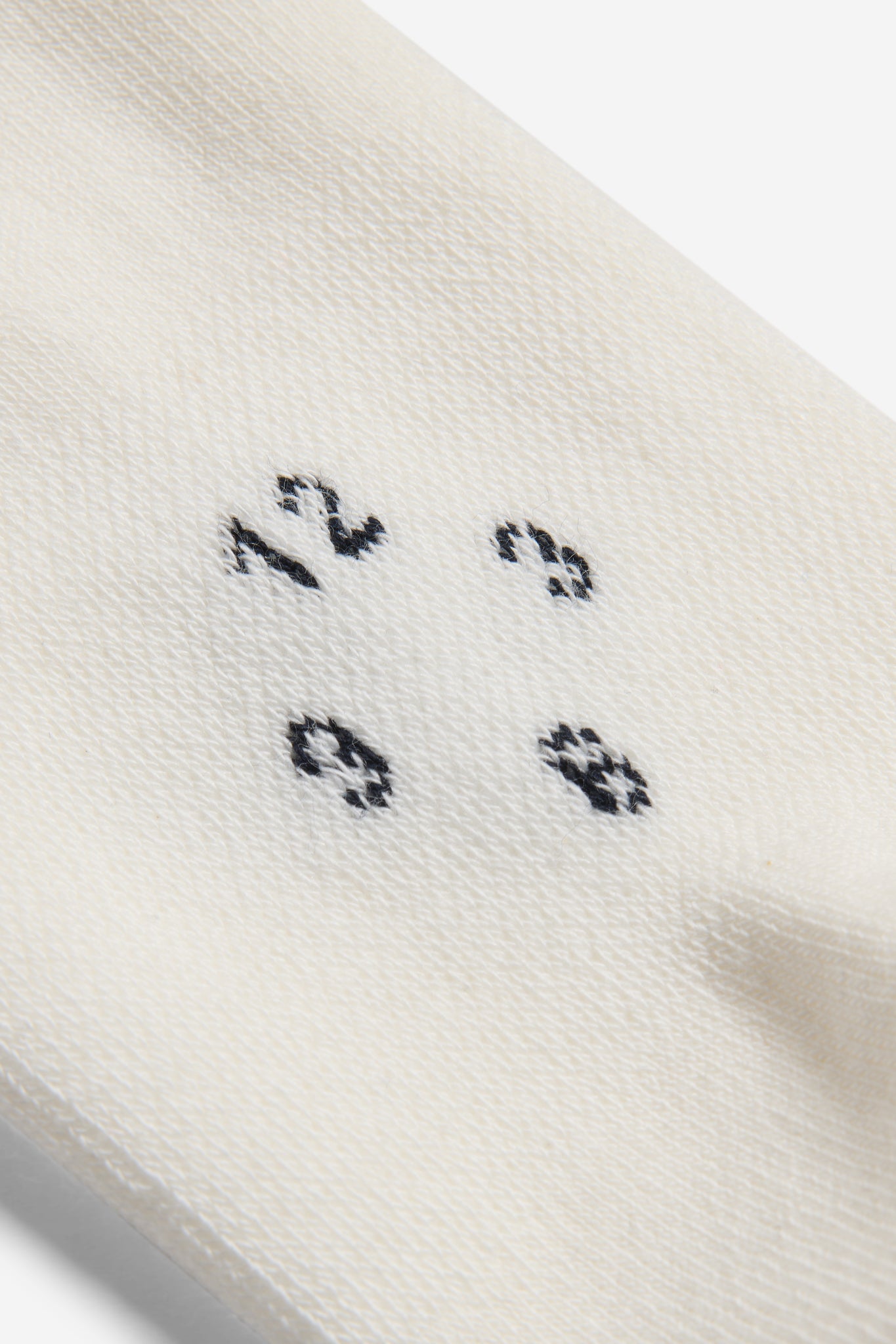 Unisex accessories socks, organic cotton mix, off-white with black embroidered numbers.