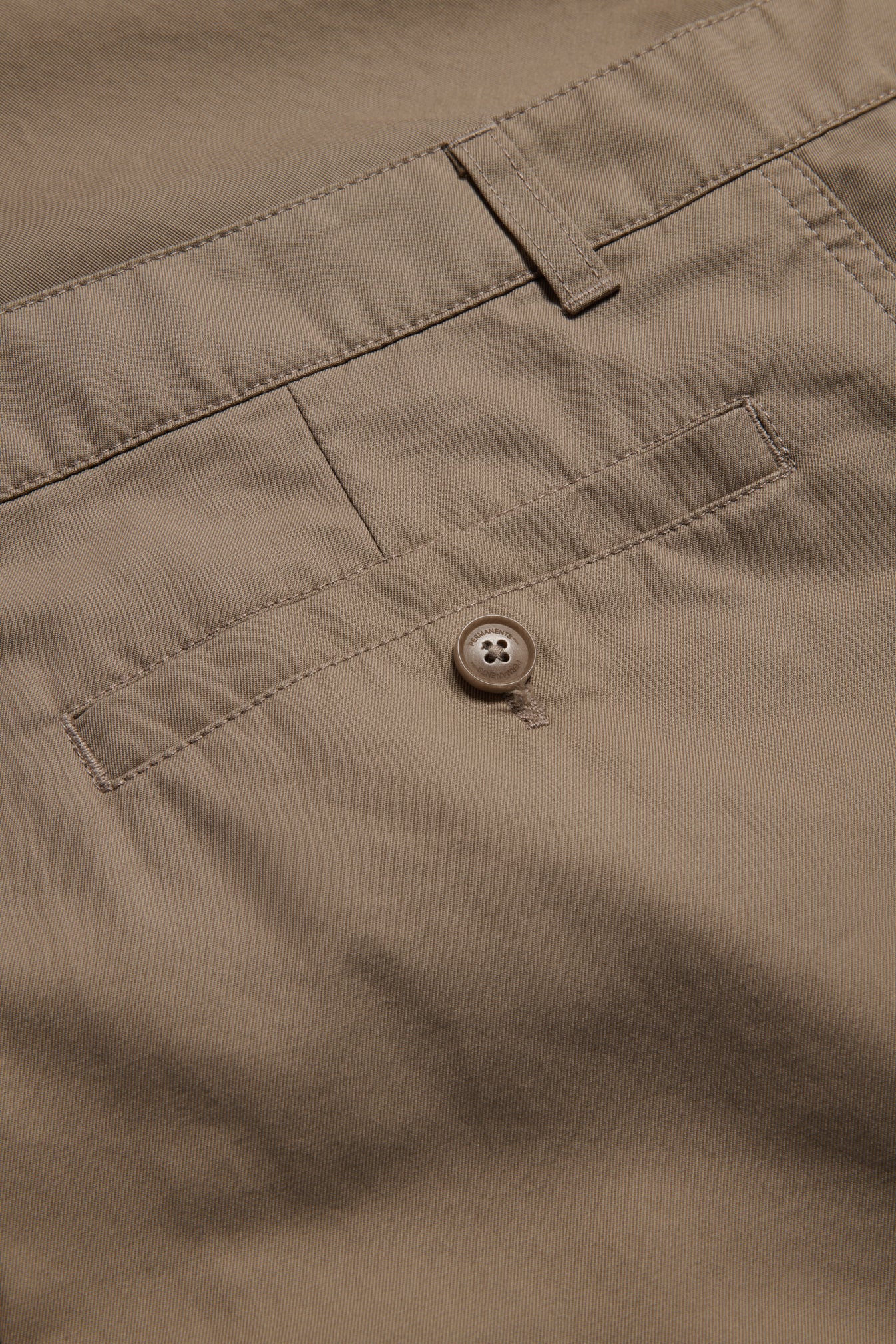 Men's long-pants, washed beige organic cotton twill, with a button-up box back pocket.