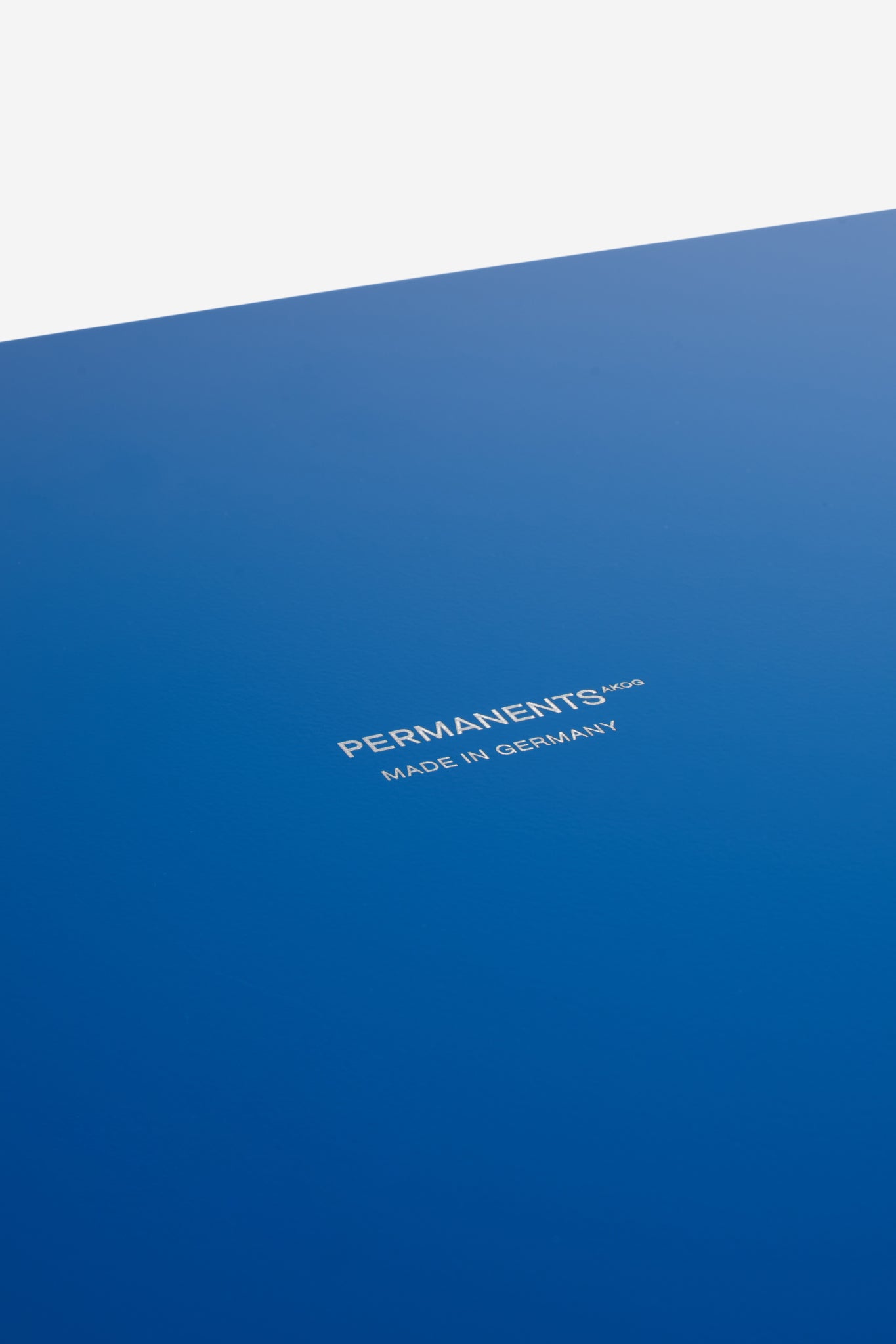 Accessories tray, large, gentian blue coated aluminum, "PERMANENTS MADE IN GERMANY" text.