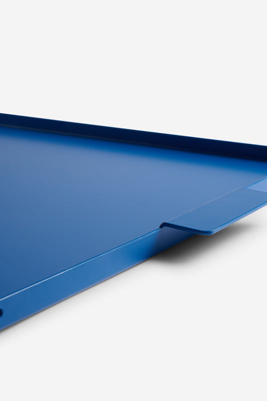 Accessories tray, gentian blue coated aluminum, 53x34cm, with integrated handles.