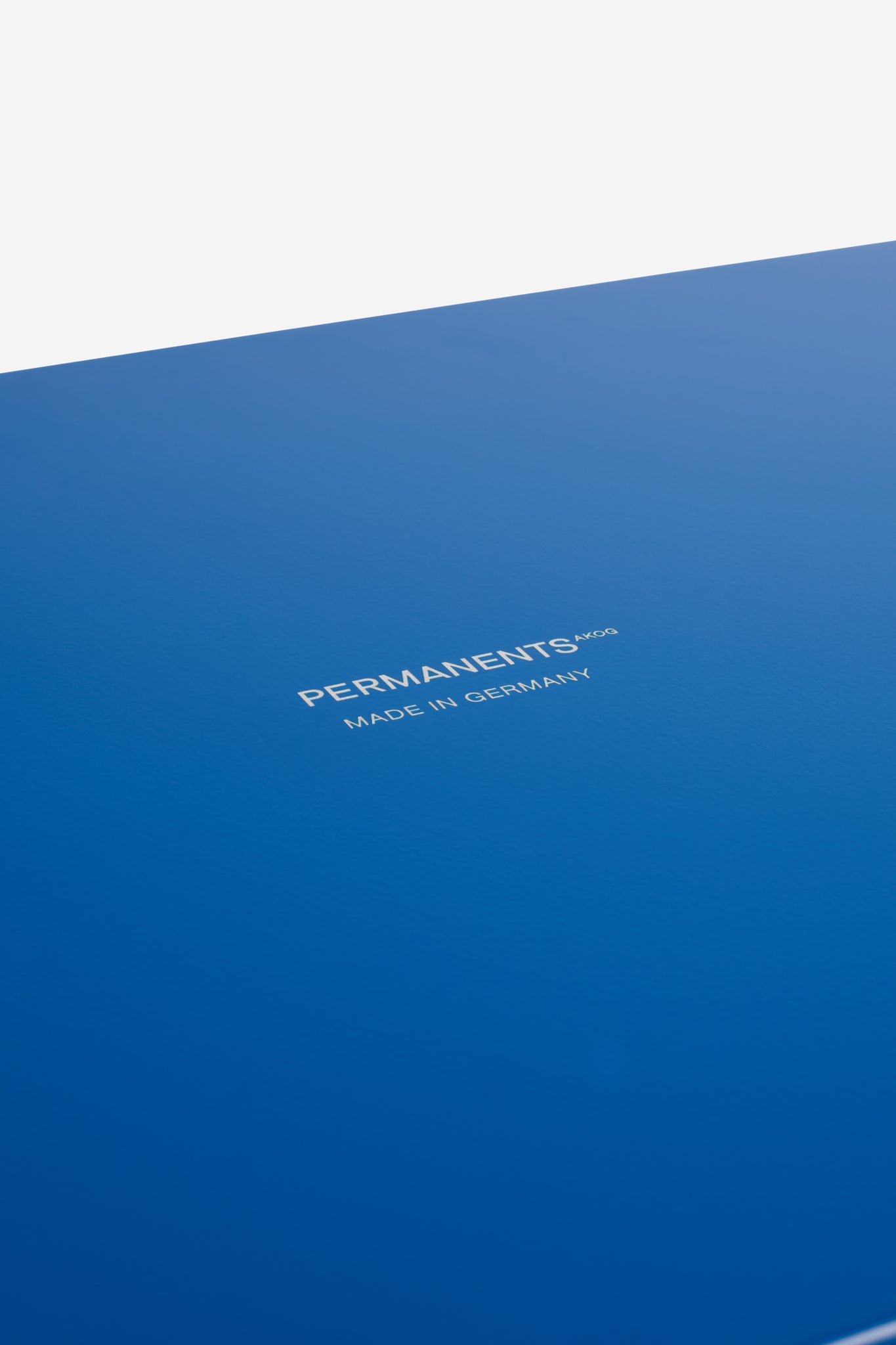 Accessories tray, small, gentian coated aluminum, with "PERMANENTS AKOG MADE IN GERMANY" text.