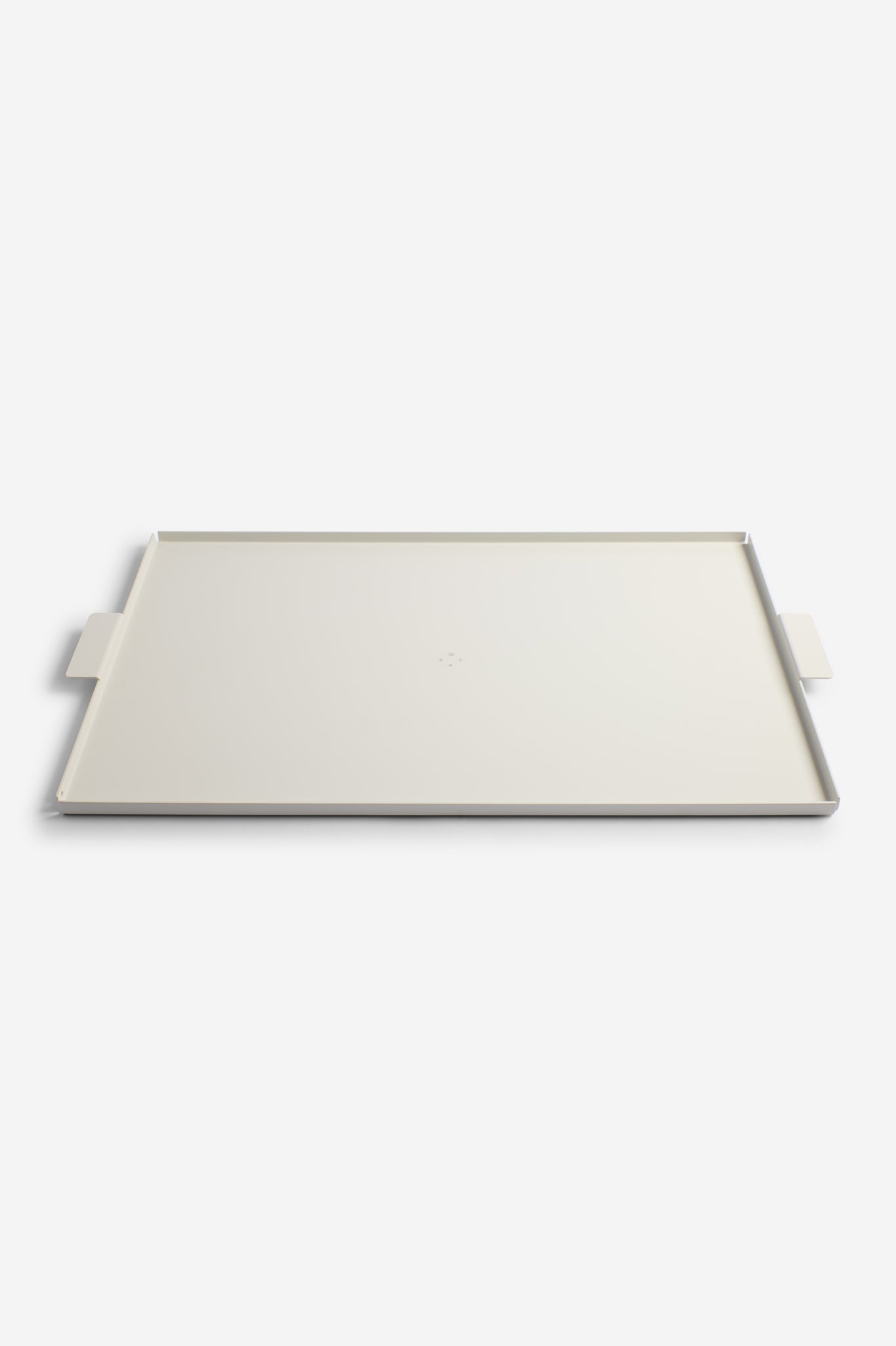 Accessories tray, white coated aluminum, 53x34cm, with subtle handles, crafted in Germany.
