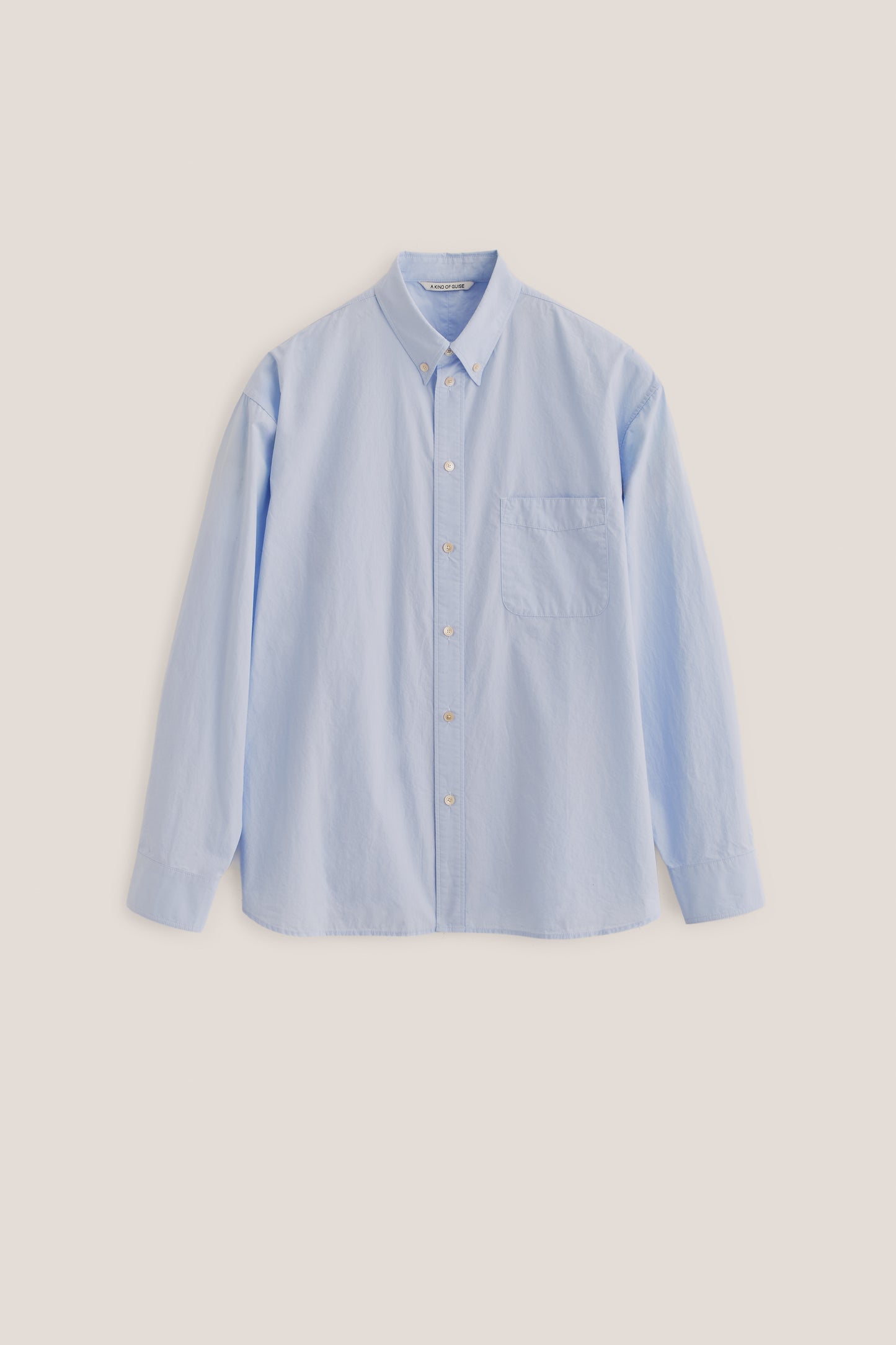 Men's long-sleeved shirt, organic cotton, garment washed, light blue, with patch pocket.