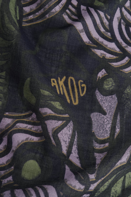 Unisex accessories bandana, 100% cotton, dark green with African wildlife print and "AKOG" logo.