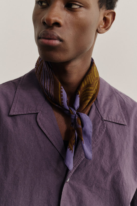 Men's accessories cotton bandana with brown and purple African wildlife print.