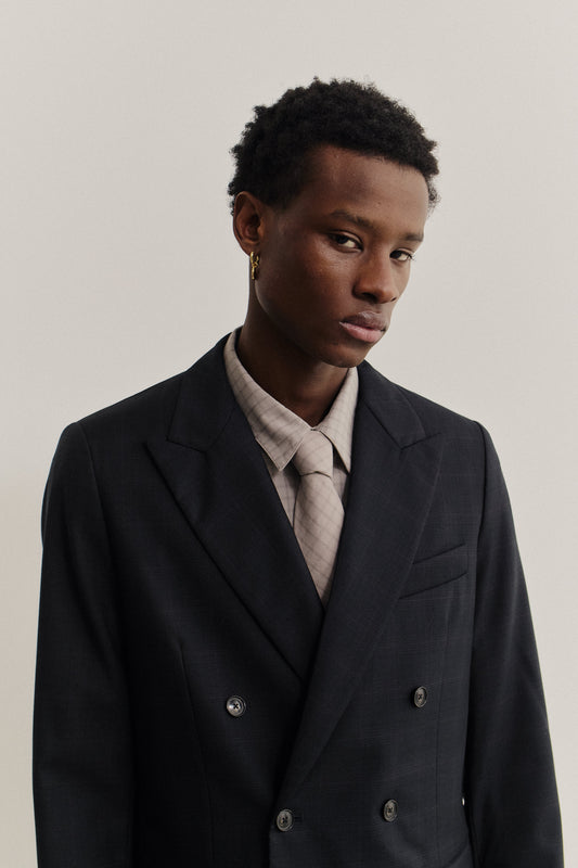 Men's tailoring, double-breasted peak blazer, 100% virgin wool, checkered black, relaxed fit.