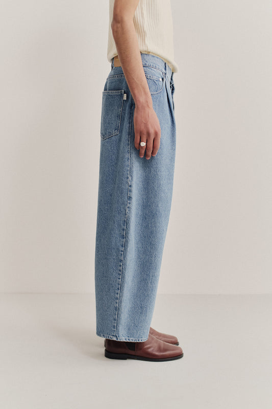 Men's long-pants, Duma Pleated Denim, light blue washed recycled cotton blend, wide fit, pleated detail.