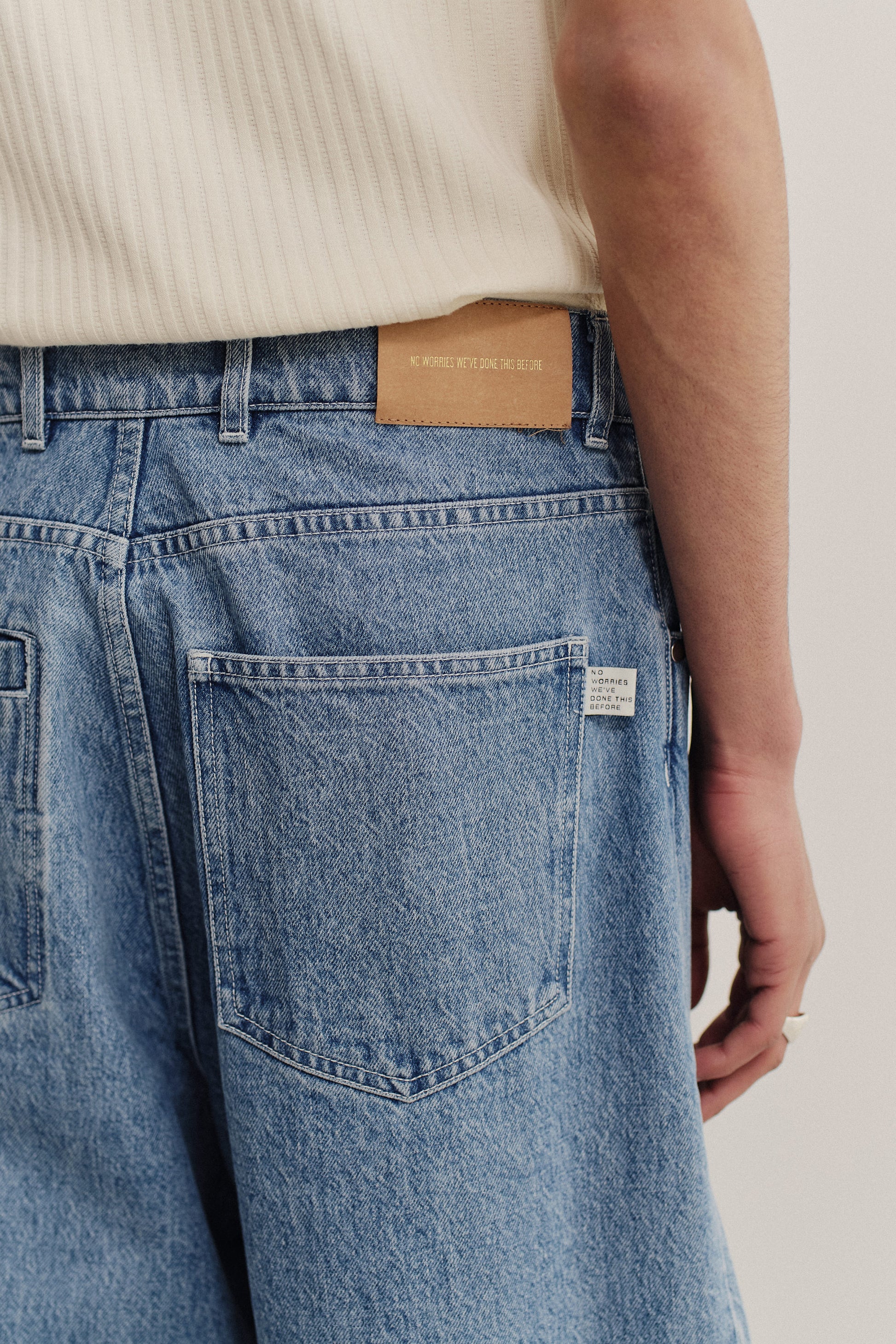 Men's long-pants, Duma Pleated Denim, recycled cotton mix, stone washed, light blue, with classic 5-pocket design.