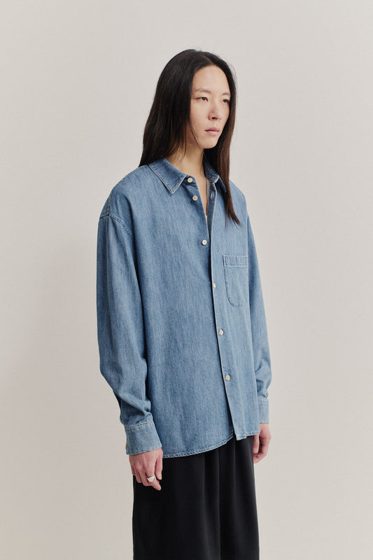 Men's long-sleeved shirt, light blue organic cotton-silk denim, oversized fit, front patch pocket, straight hem.