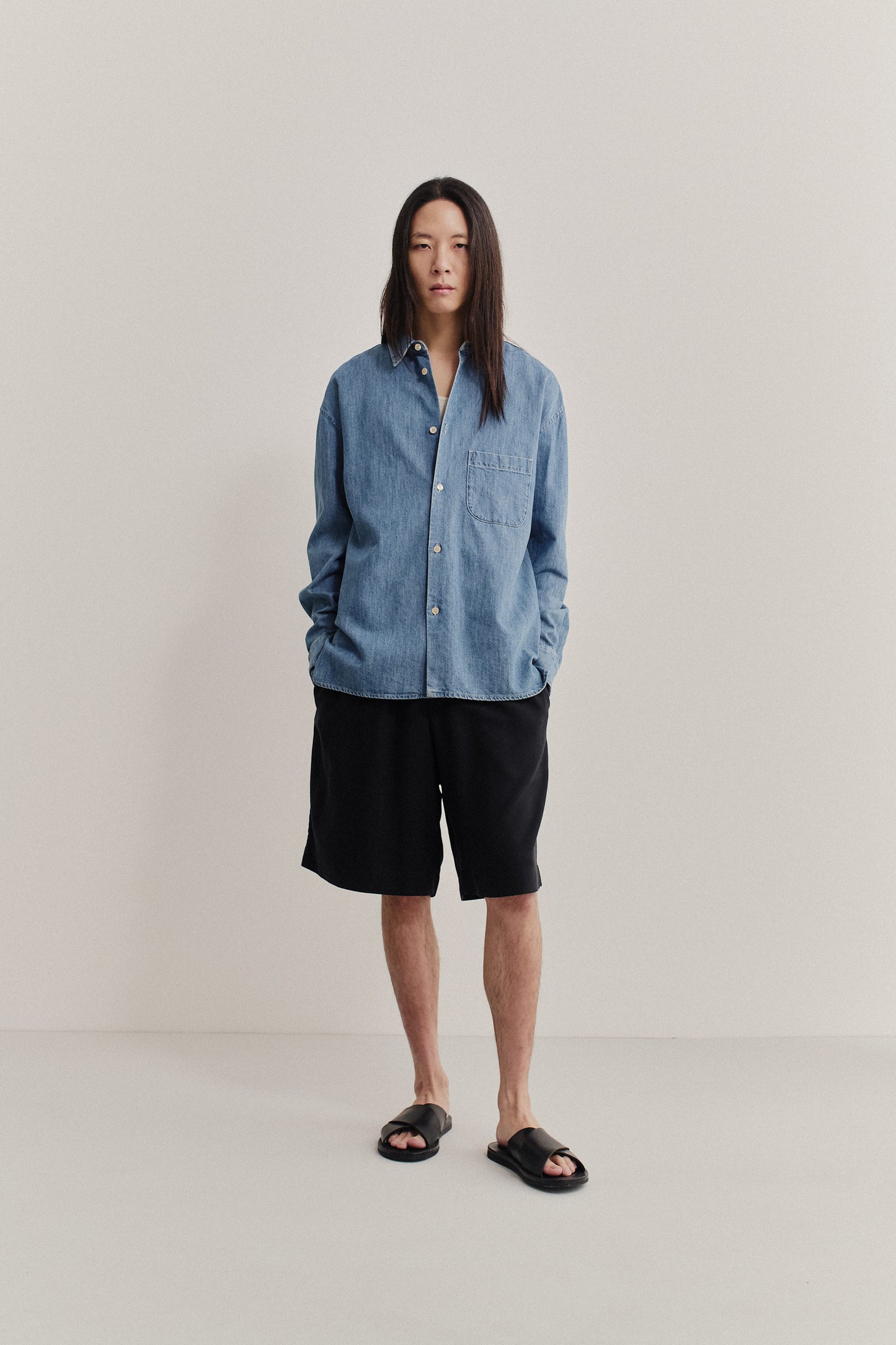 Men's long-sleeved shirt, light blue organic cotton-silk denim, oversized fit, front patch pocket.