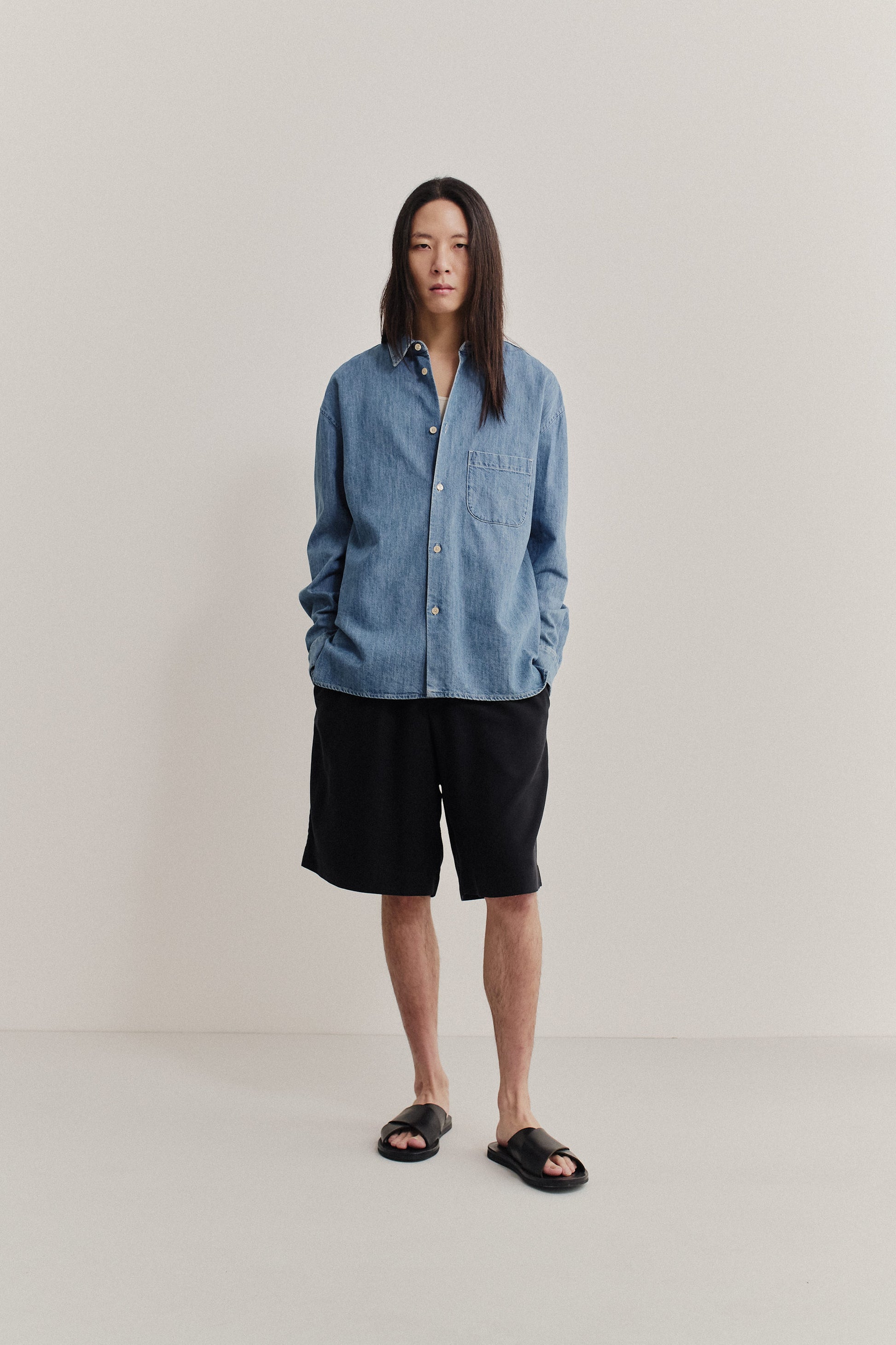Men's long-sleeved shirt, light blue organic cotton-silk denim, oversized fit, front patch pocket.
