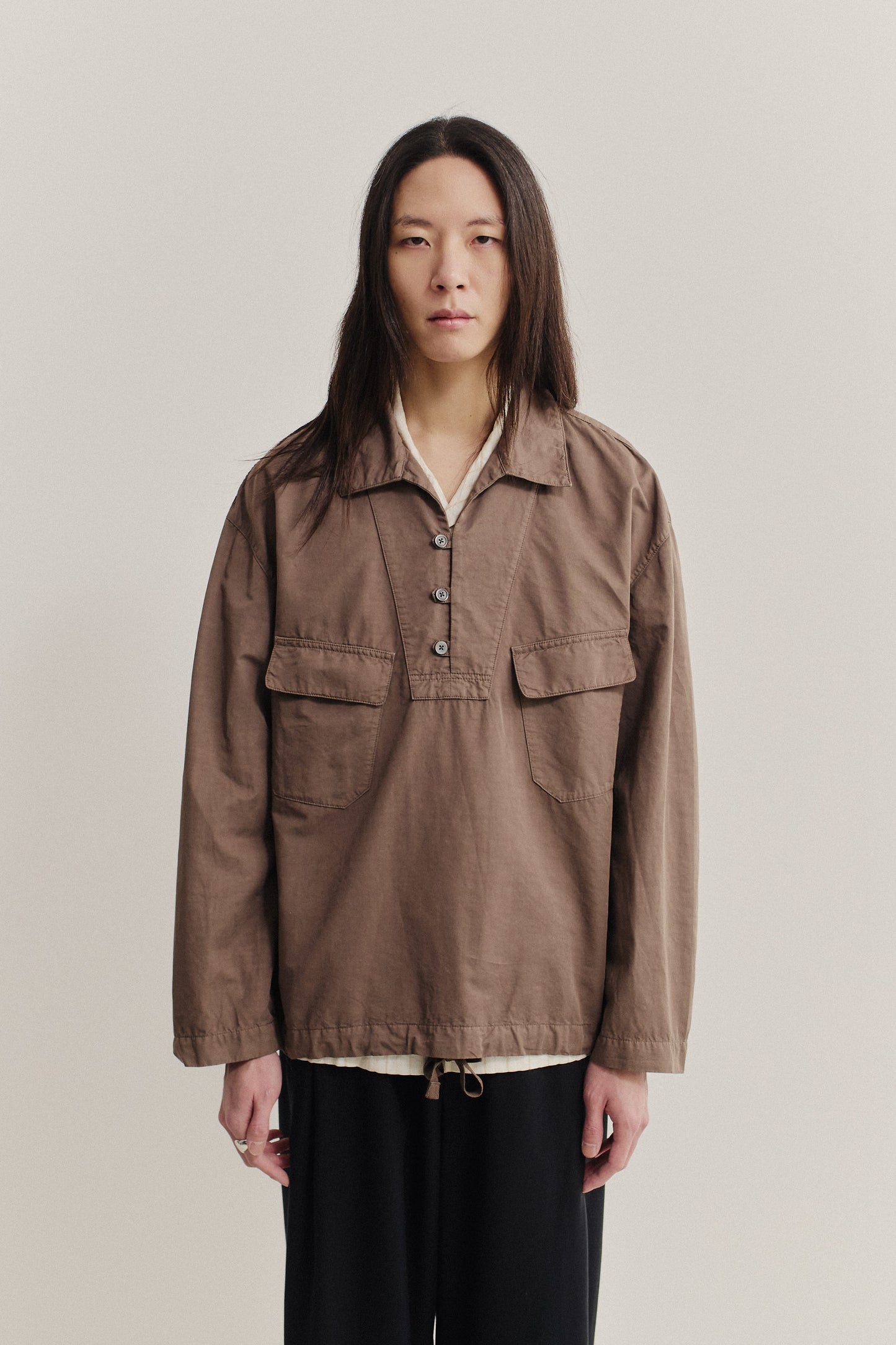 Men's long-sleeved shirt jacket, cotton-linen blend, garment dyed brown, with polo collar and patch pockets.