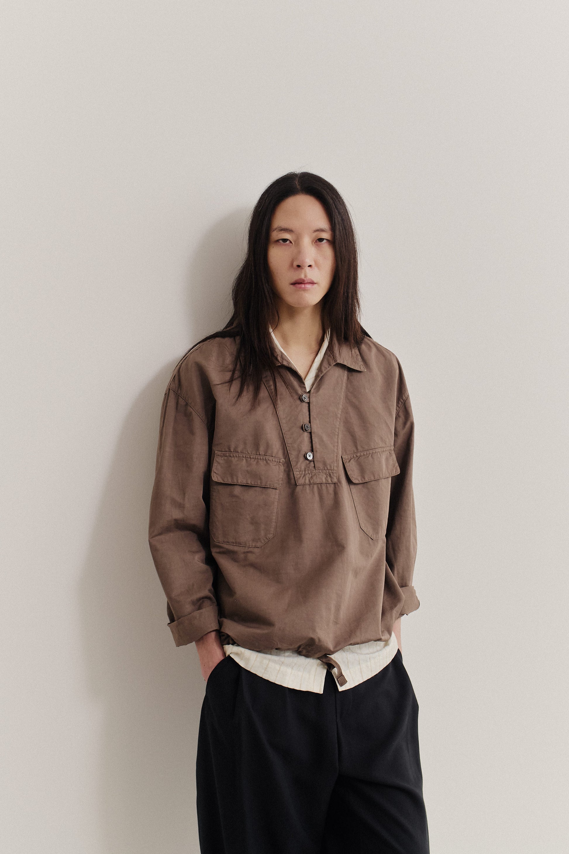 Men's long-sleeved shirt jacket, cotton-linen blend, garment dyed brown, with patch pockets and spread collar.