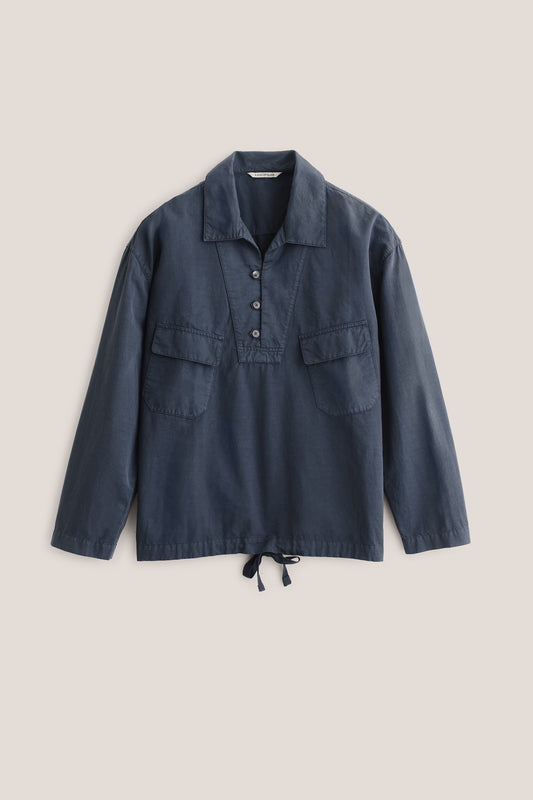 Men's long-sleeved shirt jacket, cotton-linen blend, garment-dyed navy, with spread collar, buttons, patch pockets, and adjustable hem.
