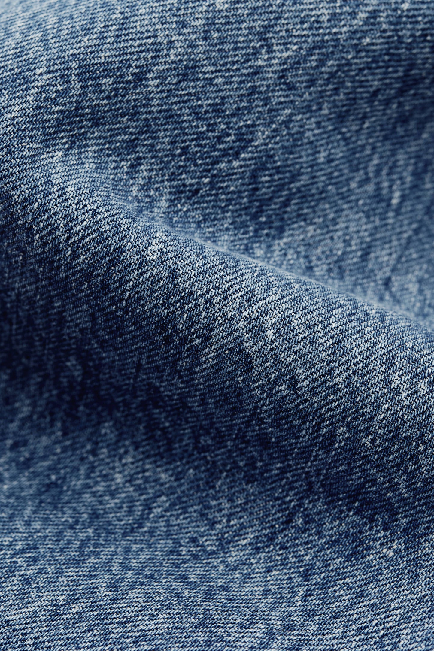 Men's outerwear jacket, washed indigo denim, boxy fit, stand-up collar, patch pockets.